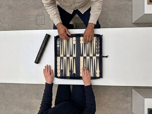Sabandija x Omar Rayo Backgammon — full-grain leather, geometric black and white pattern, roll-up