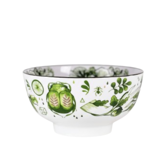 Decorative bowl with green leaf pattern on a white background