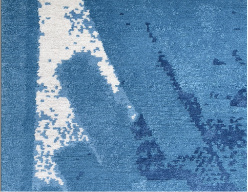 Close-up of a blue and white patterned fabric
