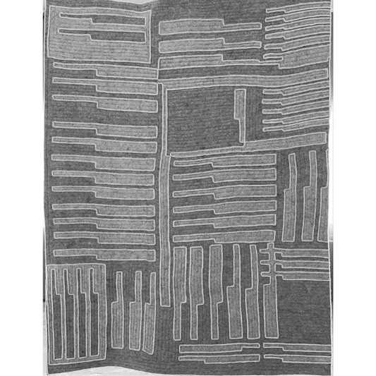 Gray and white abstract patterned rug on a plain background