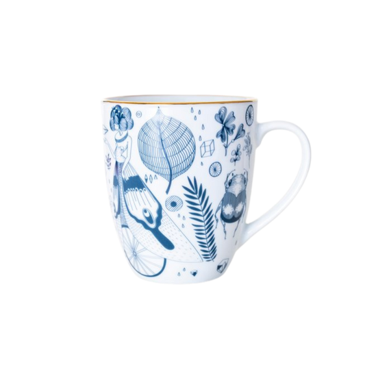 White mug with blue floral and leaf design on a white background
