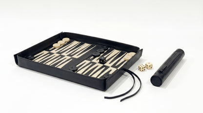 Backgammon set with pieces and dice on a white background