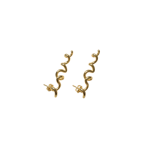 Gold spiral earrings on a white background