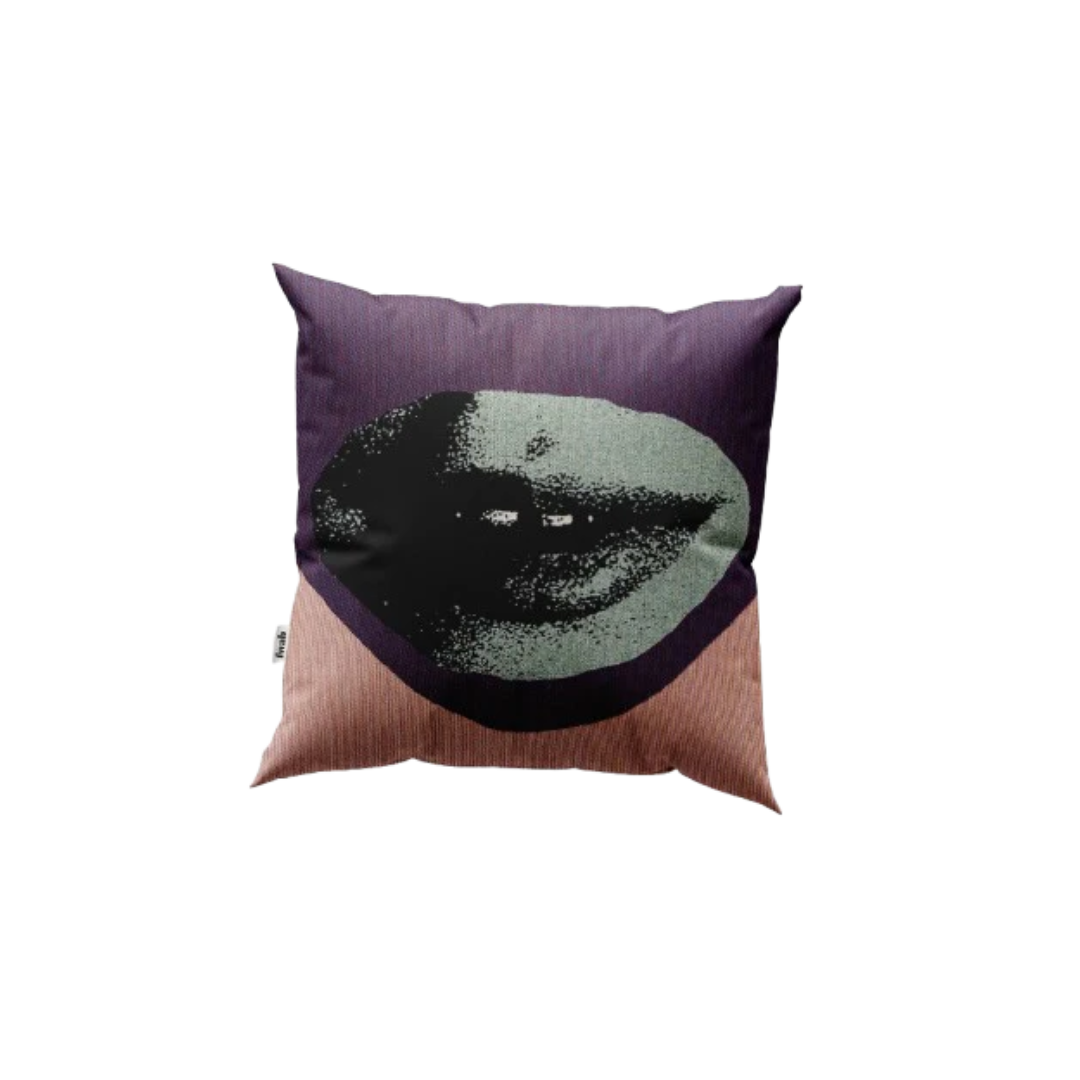 Decorative pillow with a face design on a white background