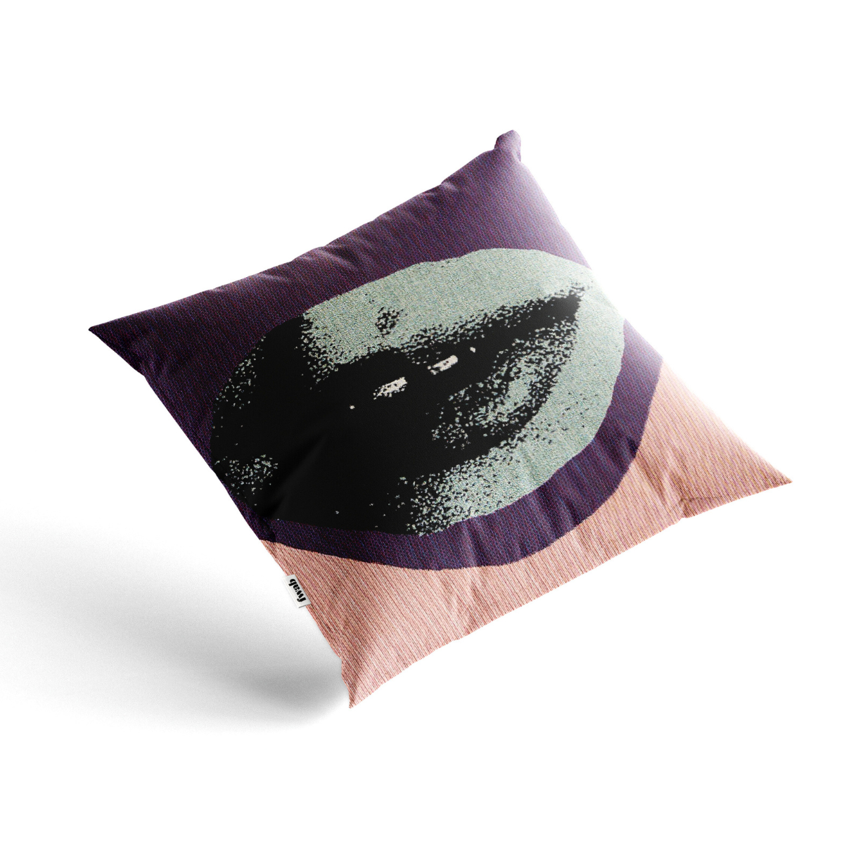 Decorative pillow with a black and white design on a purple background