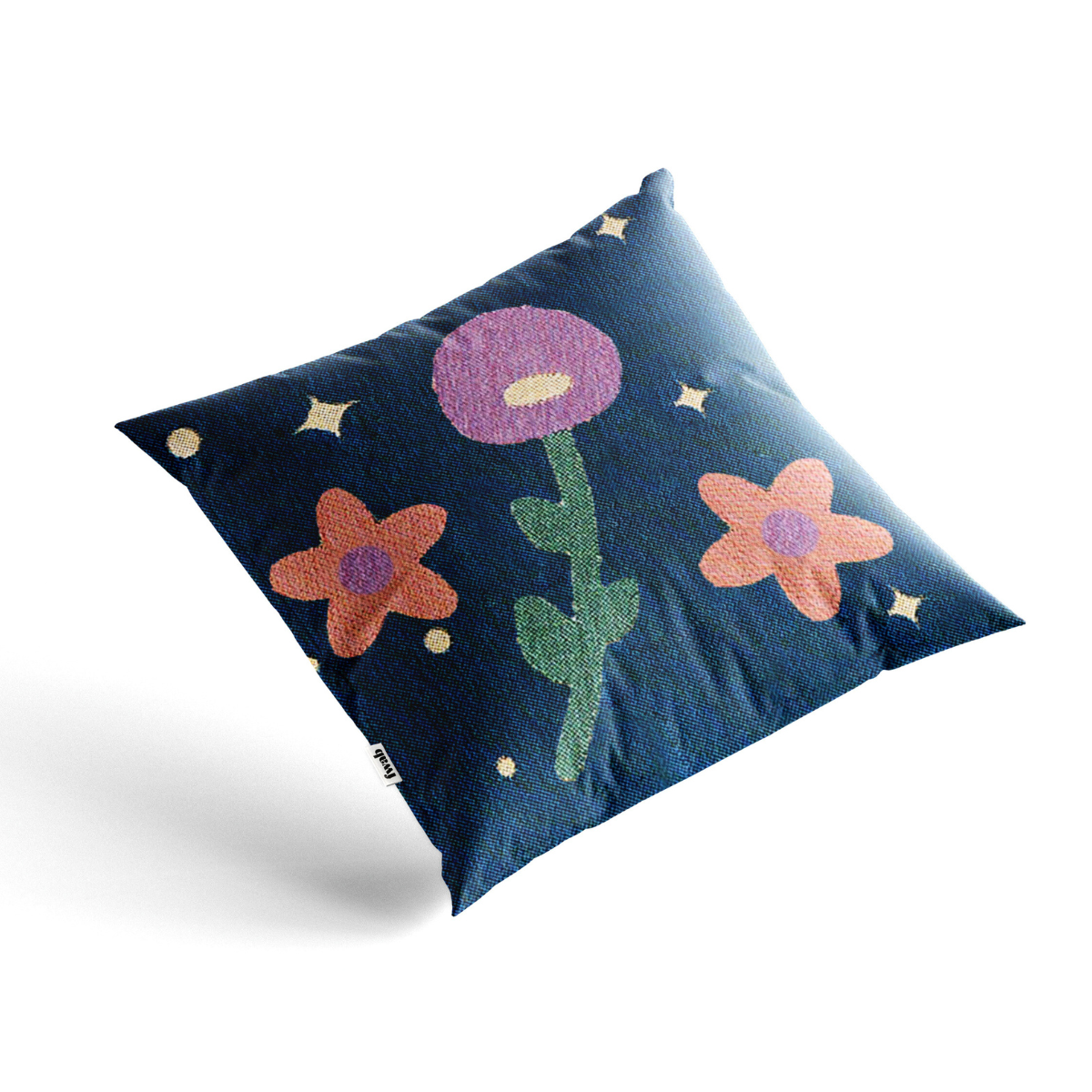 Decorative pillow with floral designs on a blue background