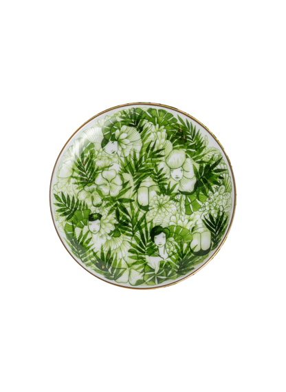 Decorative plate with green leaf pattern on a white background
