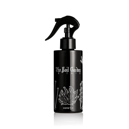 Black spray bottle with white text and graphics on a white background