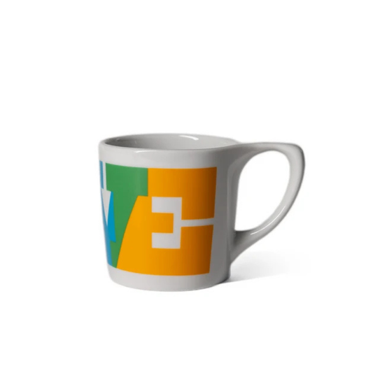 Colour of Love Mug — ceramic, multicolor geometric LOVE pattern