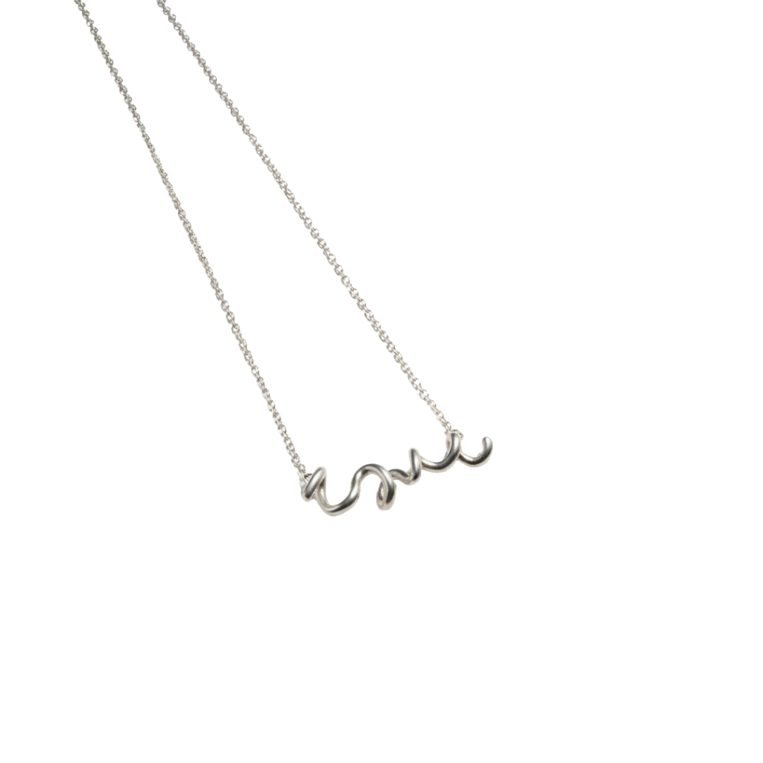 Silver necklace with 'love' pendant on a white background
