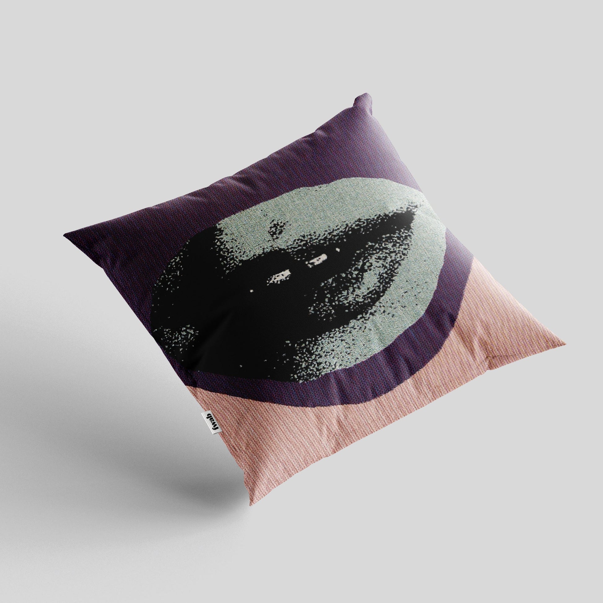 Decorative pillow with a unique design on a light gray background