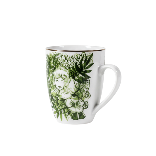 White mug with green floral design on a white background