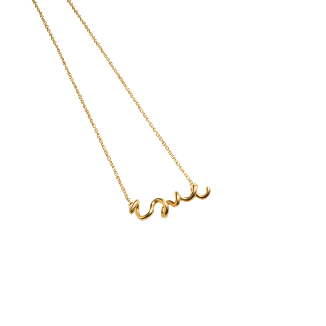 Gold necklace with 'love' pendant on a white background