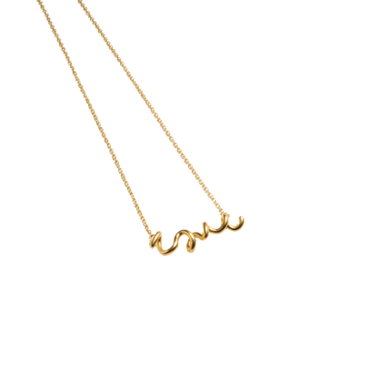 Gold necklace with 'love' pendant on a white background