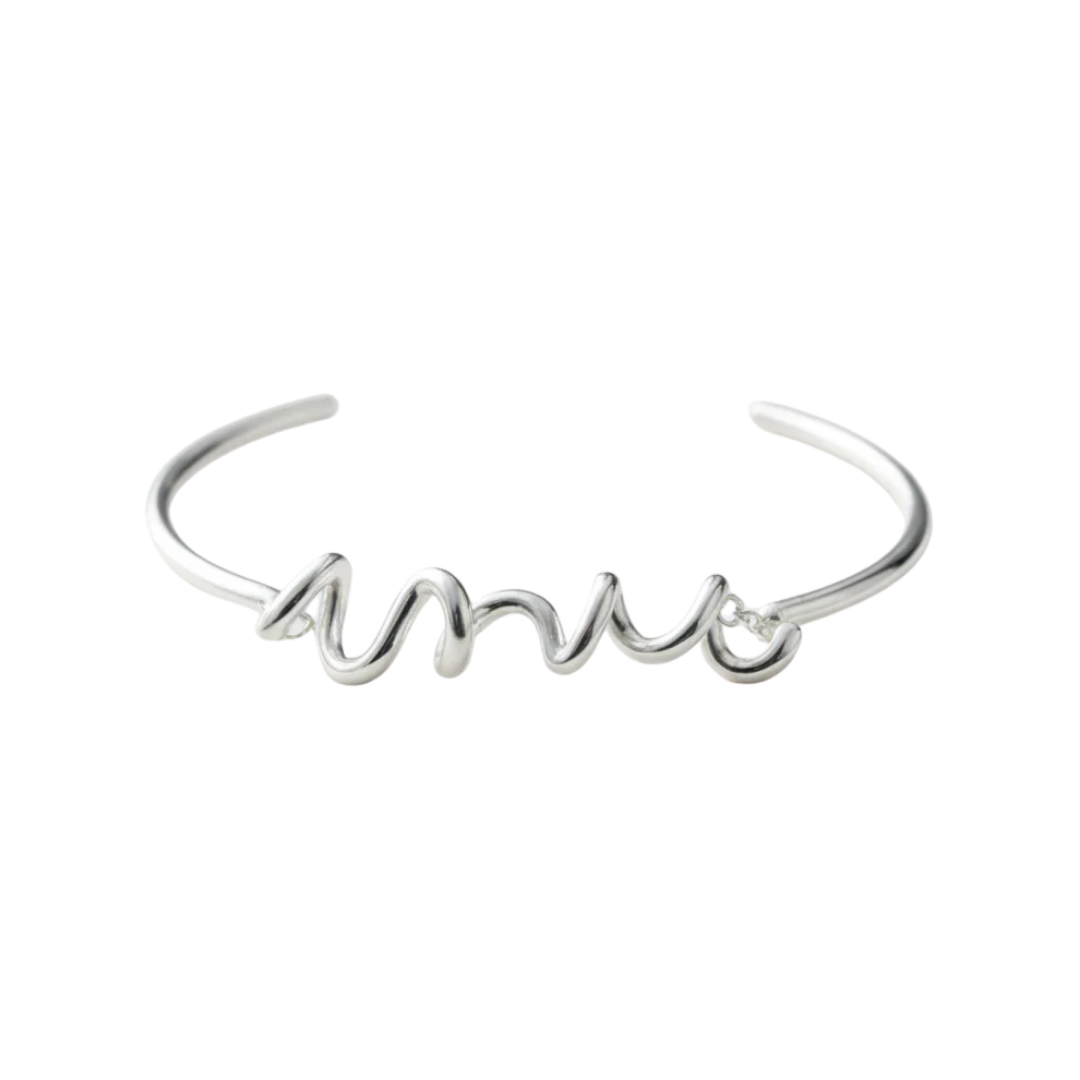 Silver bracelet with 'amor' script on a white background