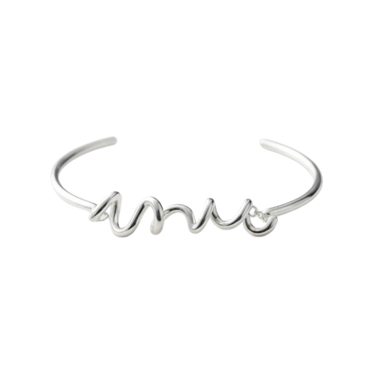 Silver bracelet with 'amor' script on a white background