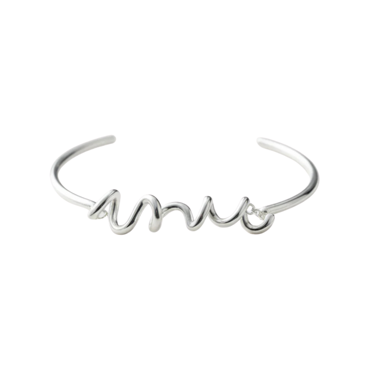 Silver bracelet with 'amor' script on a white background